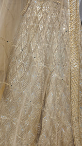 Golden Silk Lehenga with Sequins, Zari, Mirror and Beads Work