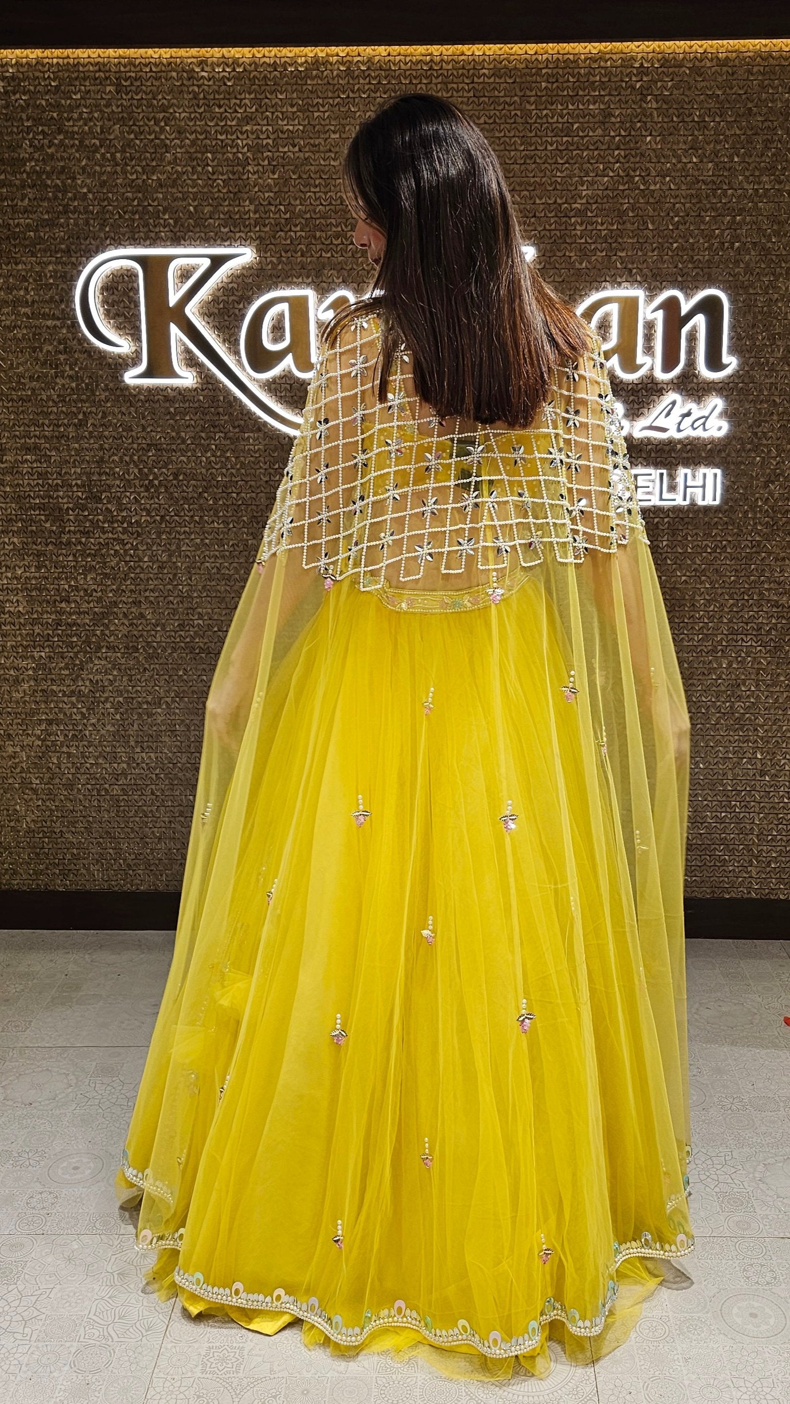 Yellow Lehenga Choli with Embroidered Cape