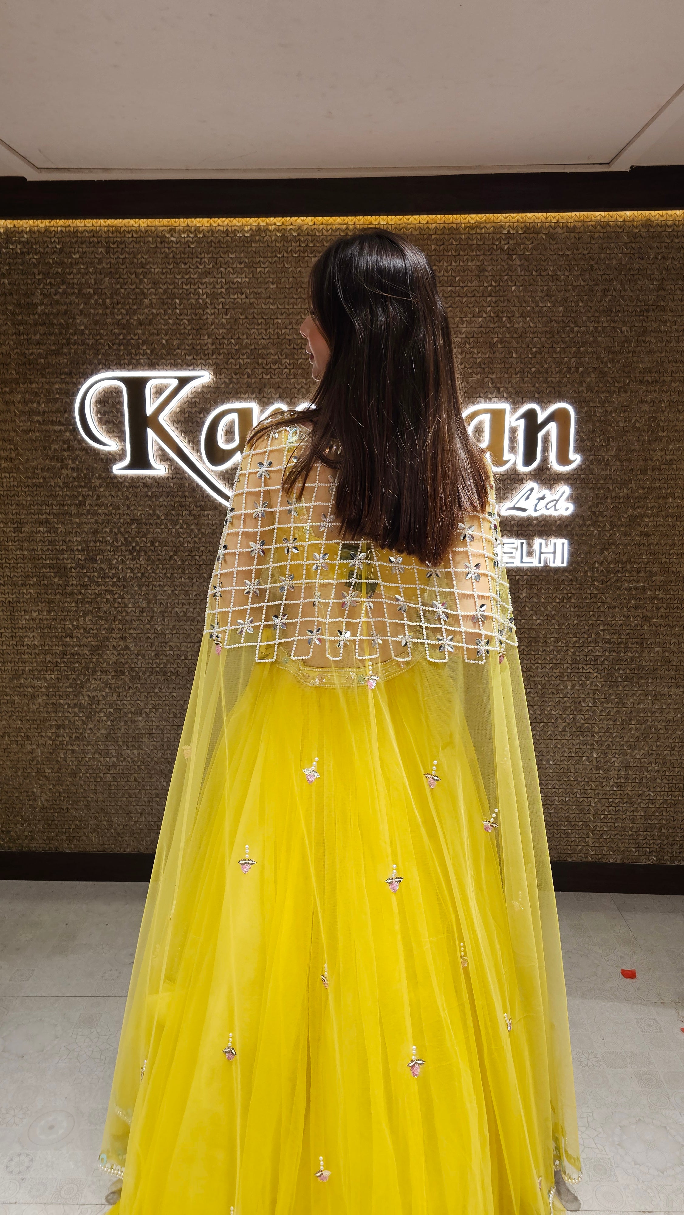 Yellow Lehenga Choli with Embroidered Cape