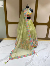 Load image into Gallery viewer, Pista Green Organza Lehenga With Zari, Sequins and Multi-Thread Work
