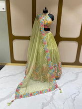 Load image into Gallery viewer, Pista Green Organza Lehenga With Zari, Sequins and Multi-Thread Work
