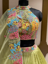 Load image into Gallery viewer, Pista Green Organza Lehenga With Zari, Sequins and Multi-Thread Work
