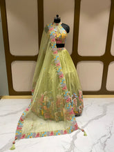 Load image into Gallery viewer, Pista Green Organza Lehenga With Zari, Sequins and Multi-Thread Work
