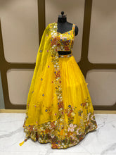 Load image into Gallery viewer, Yellow Organza Lehenga With Sequins, Pearl Work and Multi-Thread Work
