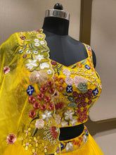 Load image into Gallery viewer, Yellow Organza Lehenga With Sequins, Pearl Work and Multi-Thread Work
