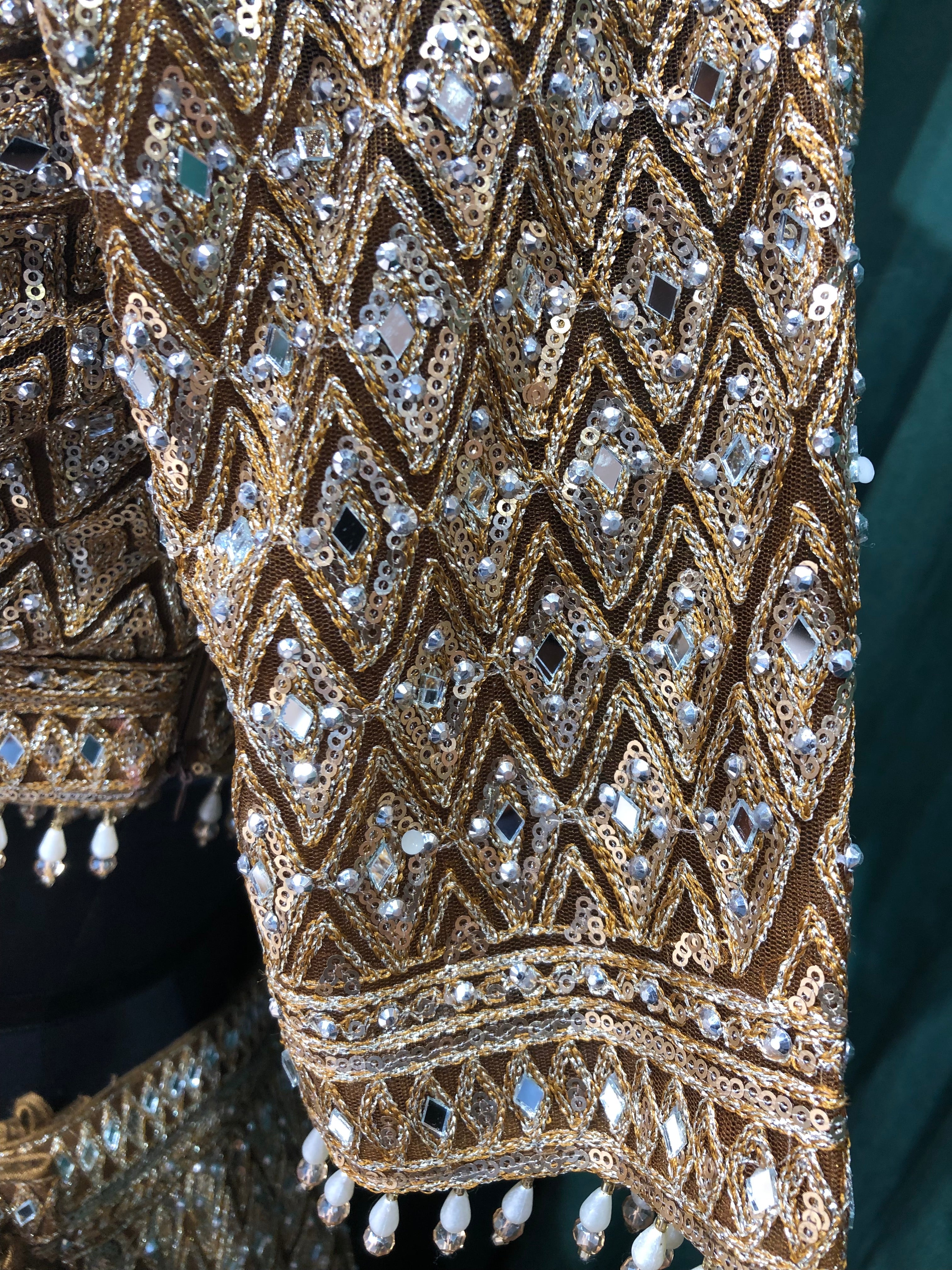 Golden Net Lehenga with Sequins Work