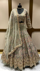 Pista Green Peacock Net Lehenga With Multithread & Sequins Work