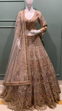 Load image into Gallery viewer, Mauve Net Lehenga with Zari, Mirror and Sequins
